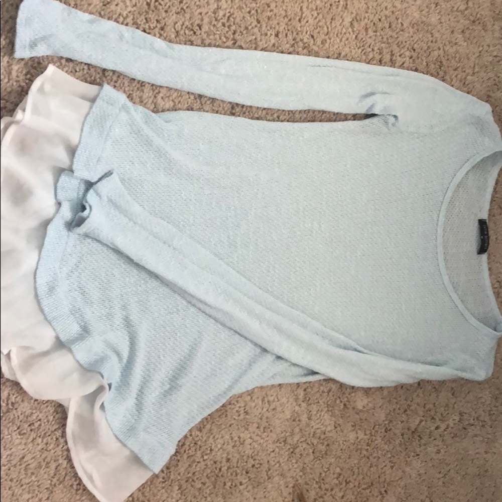 Baby blue sweater with white detailing